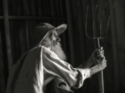 Old Farmer with Pitchfork